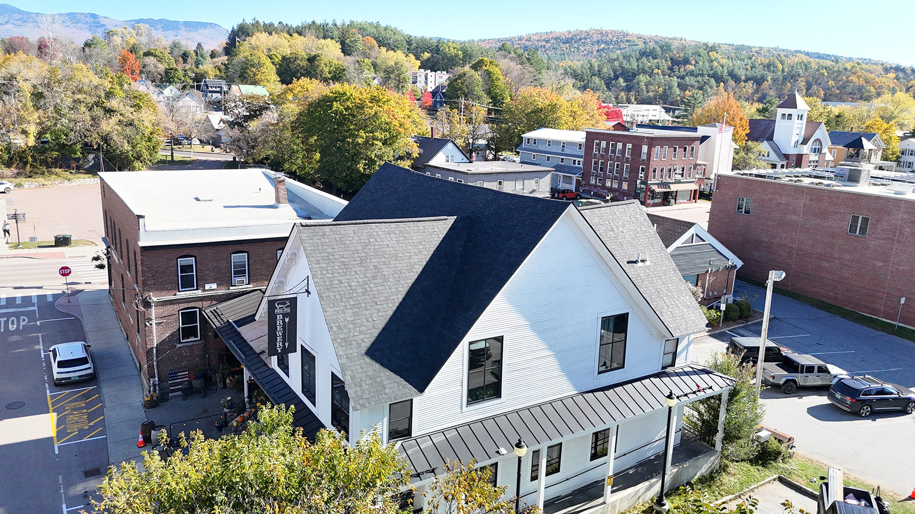 Commercial shingle roof replacement Prohibition Pig Brewery Waterbury Vermont aerial