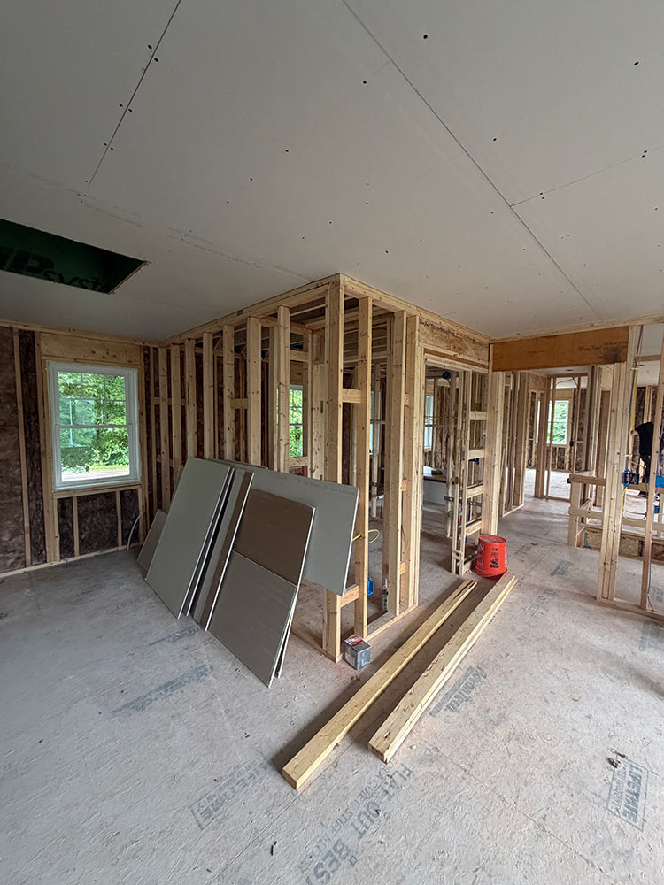 Drywall hang in progress full home addition Williston Vermont
