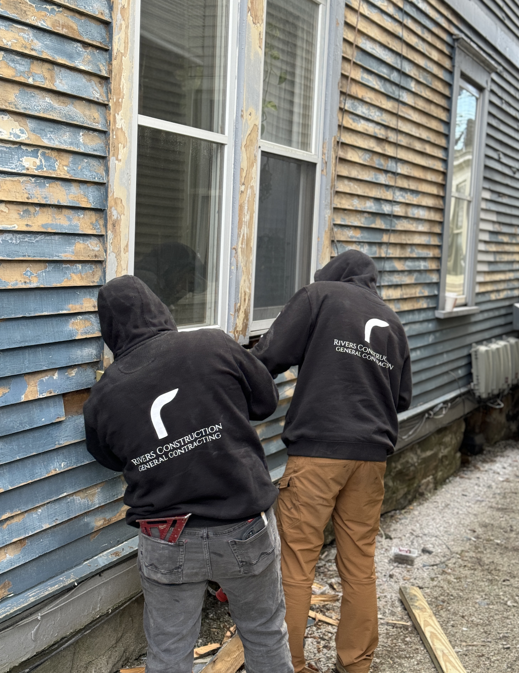 Exterior painting surface preparation Vermont Rivers Construction crew