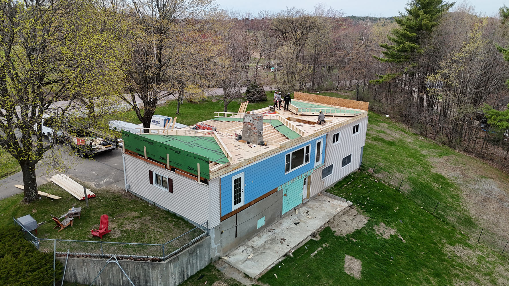 Framing crew working on second story addition Williston Vermont aerial