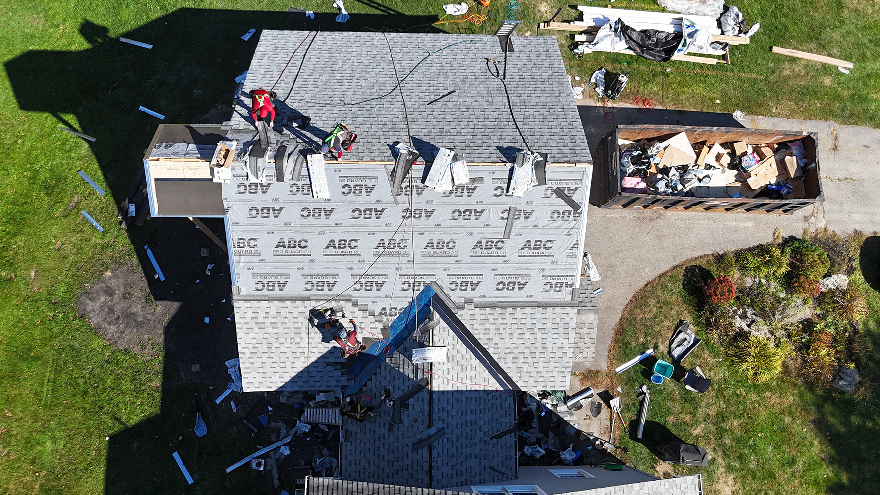 Overhead drone view of ABC Pro Guard 80 underlayment being installed on new construction roof in Stowe Vermont