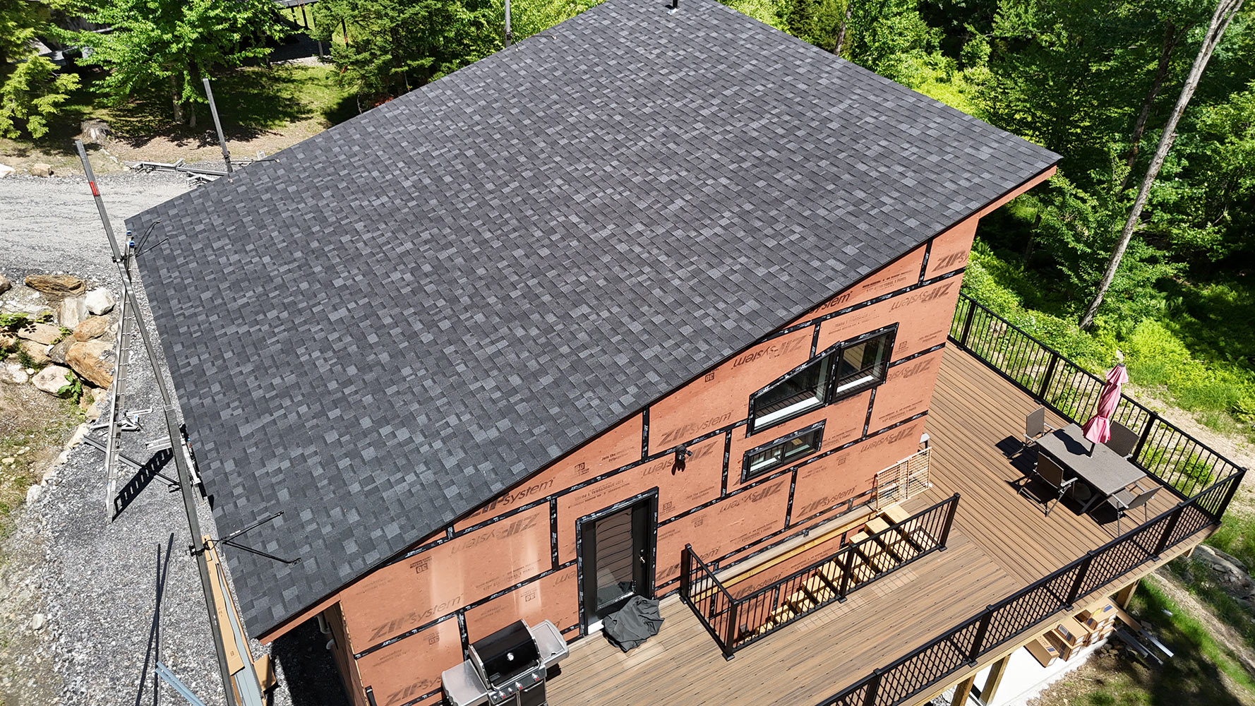 New construction shingle roof completed Stowe Vermont modern home aerial
