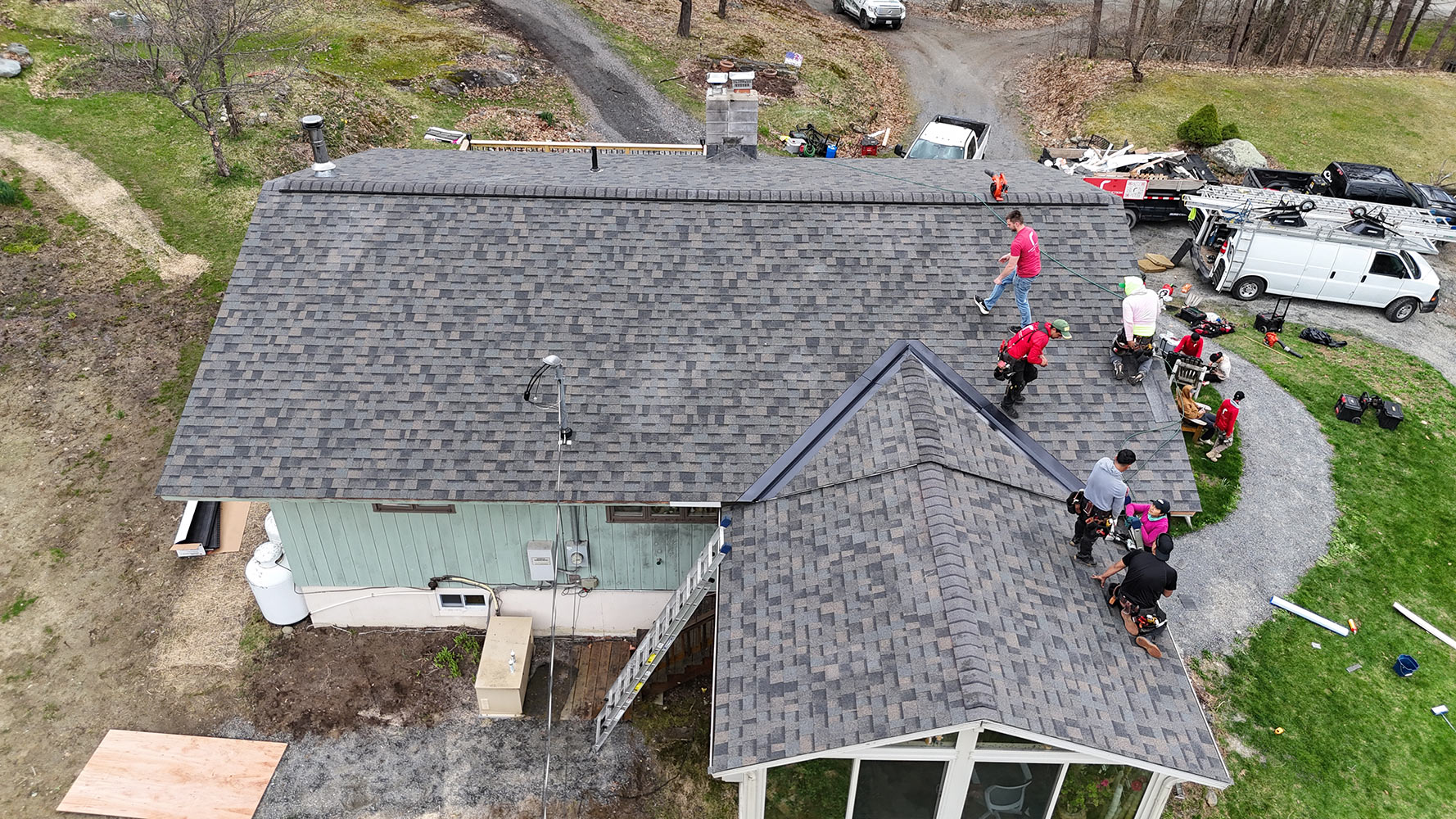 Residential roof replacement Underhill Vermont — full crew aerial