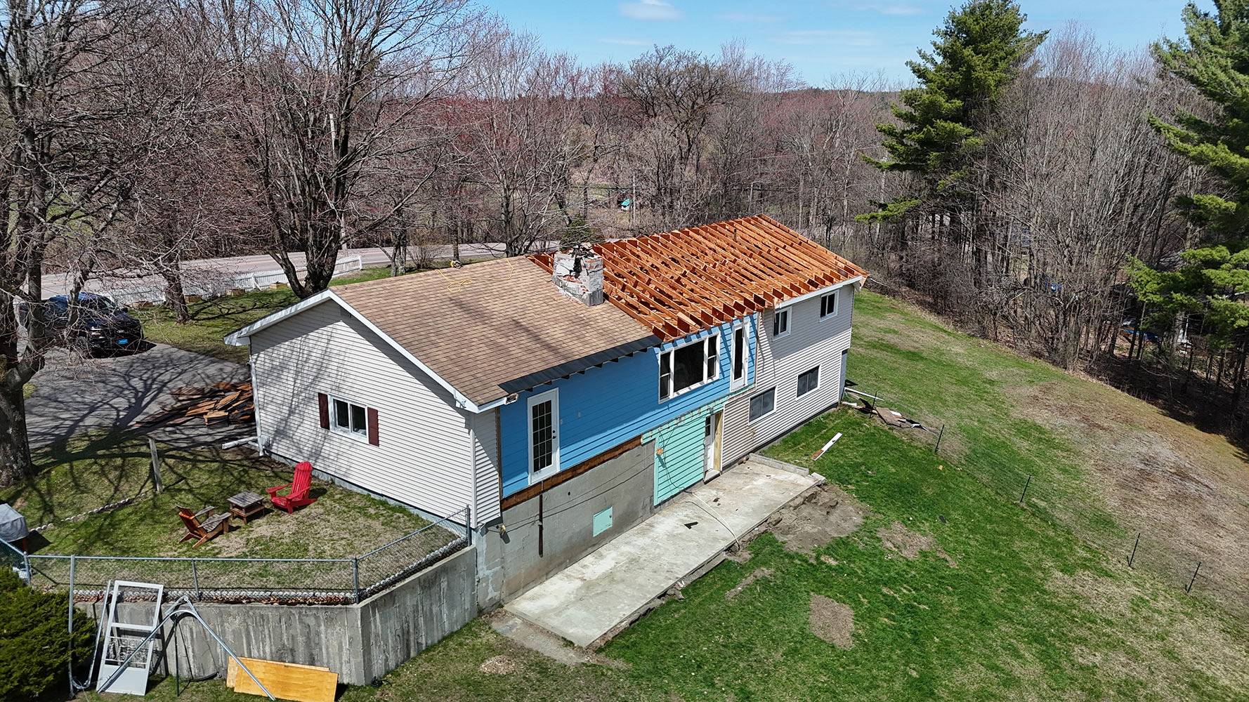 Before: rear exterior roof off full home addition Williston Vermont aerial