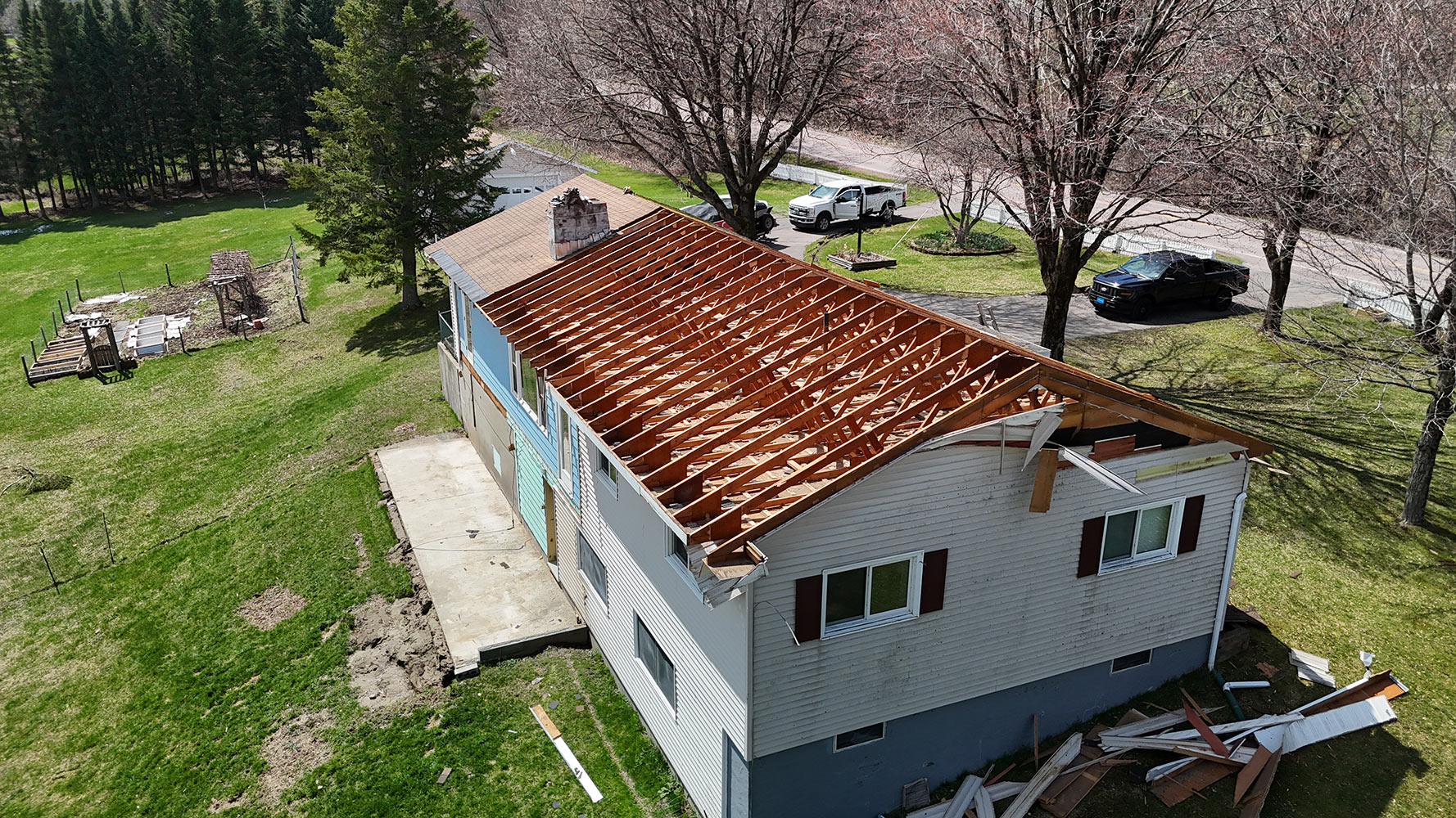 Second floor addition roof tear-off and framing underway Williston Vermont aerial
