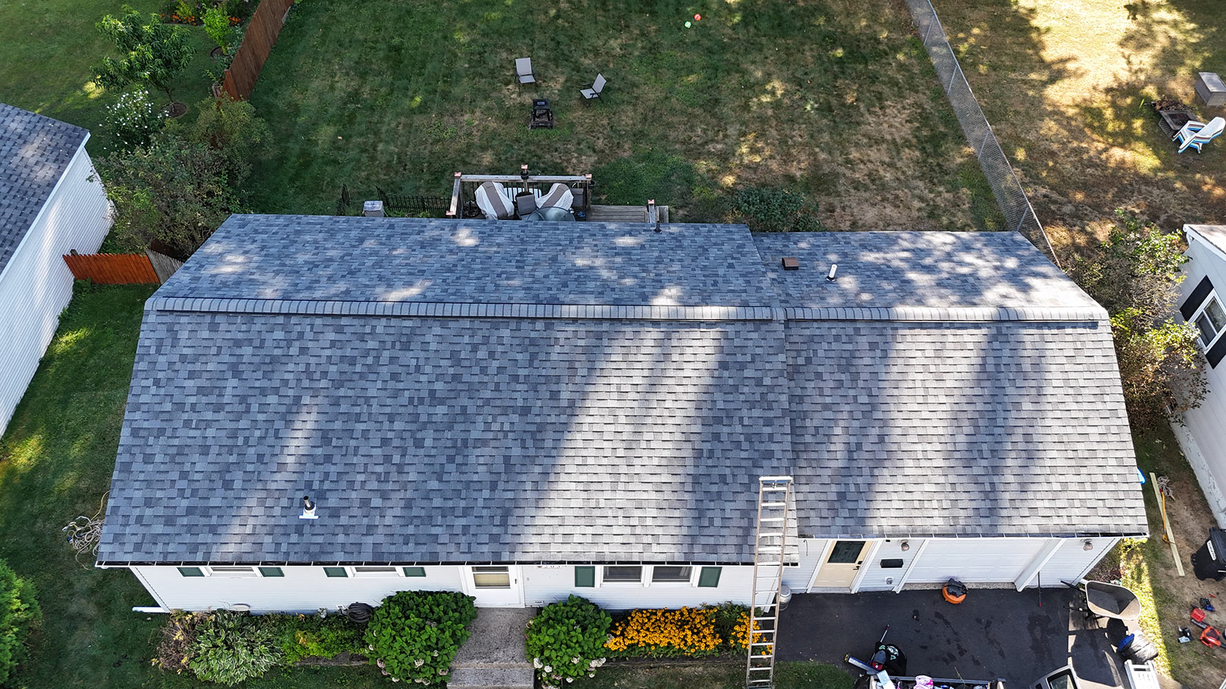 Residential roof replacement North End Burlington Vermont — completed Owens Corning shingles aerial view