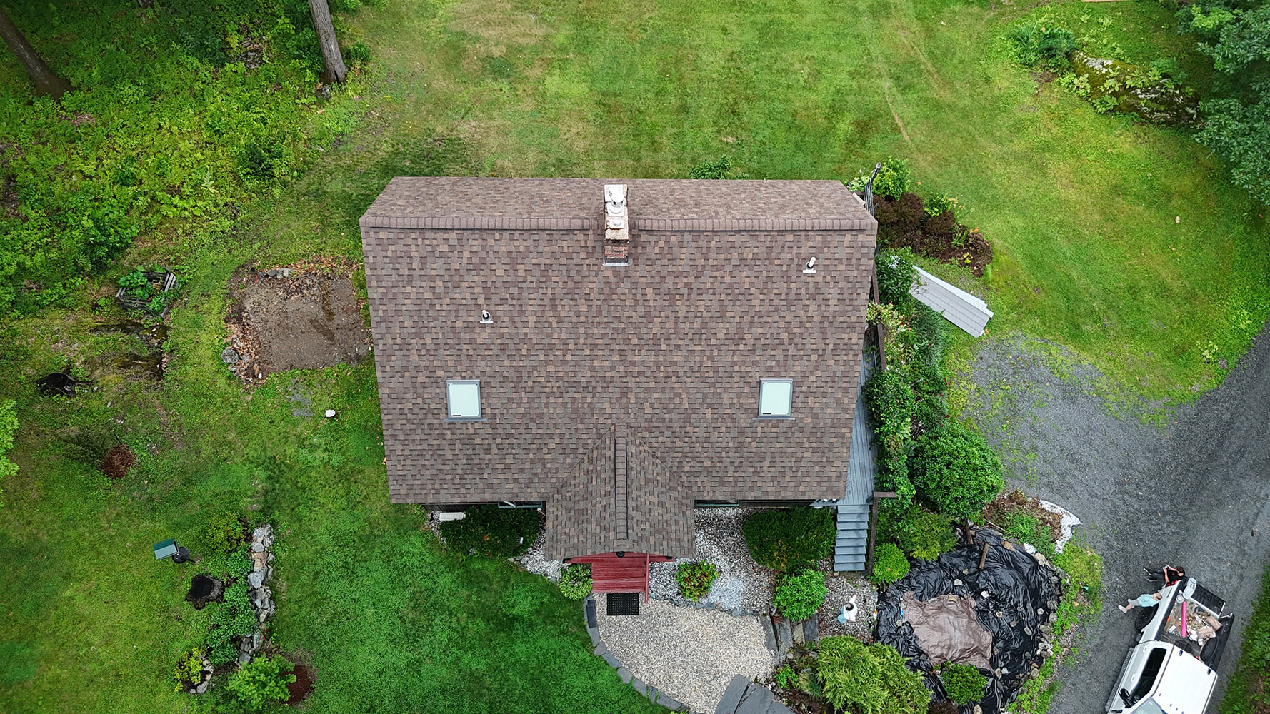 Completed shingle roof with skylights Richmond Vermont aerial