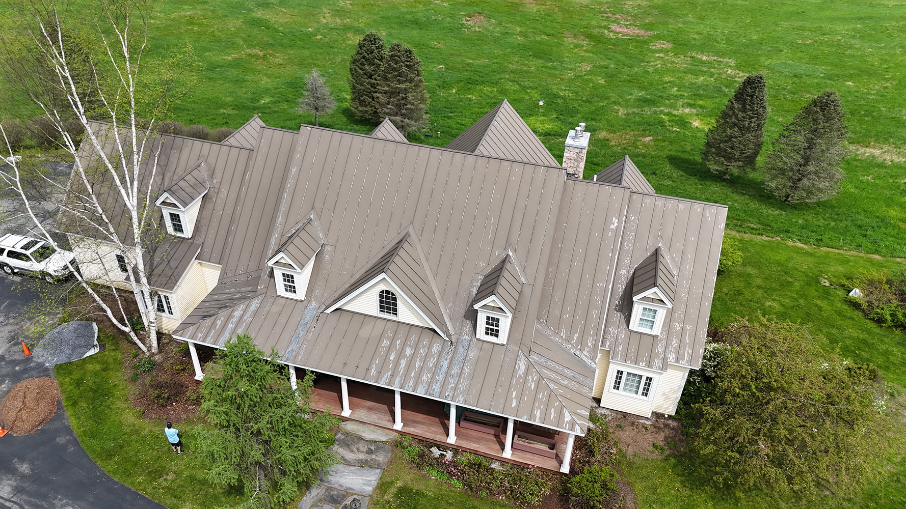 Standing seam metal roof Vermont country estate aerial view